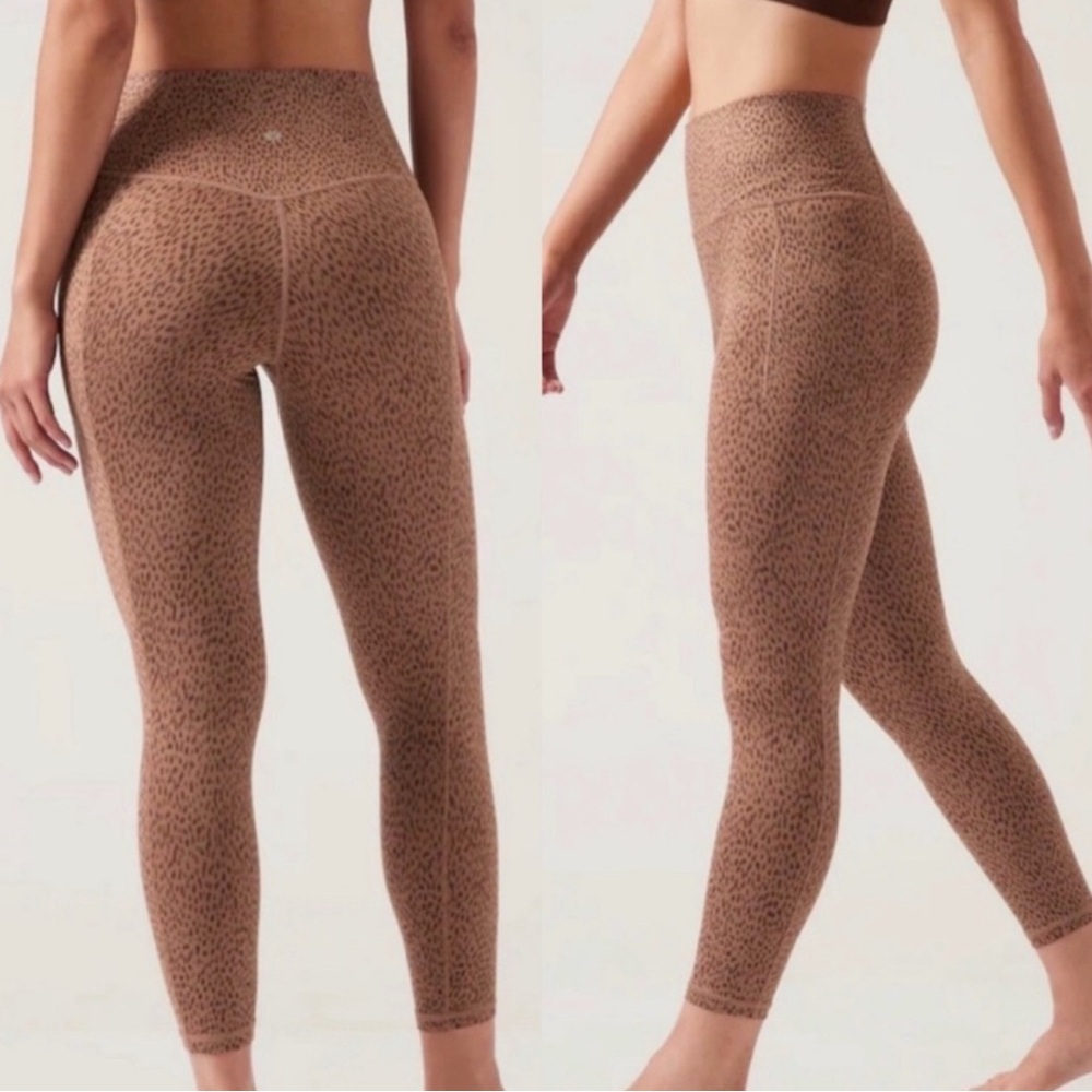 Athleta womens cheetah salutation stash pocket II printed 7/8 tight size large